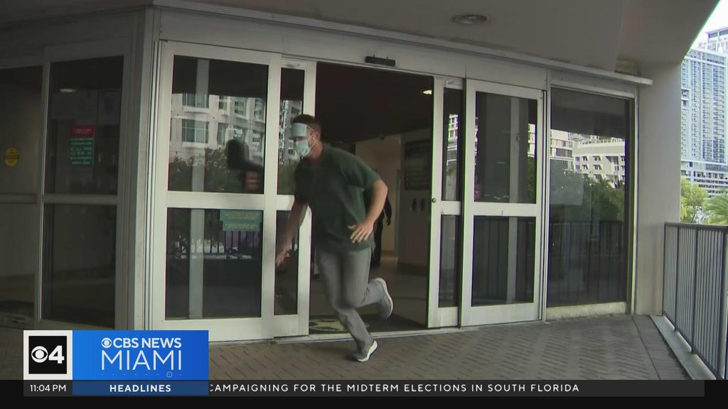 Ex-Lauderhill cop arrested for impersonating dead man runs away from cameras after release — CBS Miami, Coral Gables Community news