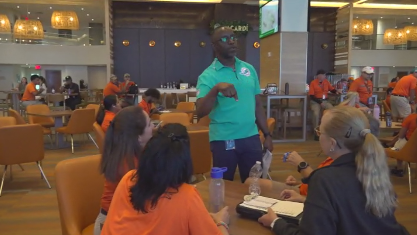 Miami Dade College professor finds his passion with side job at Hard Rock Stadium — CBS Miami, Coral Gables Arts news